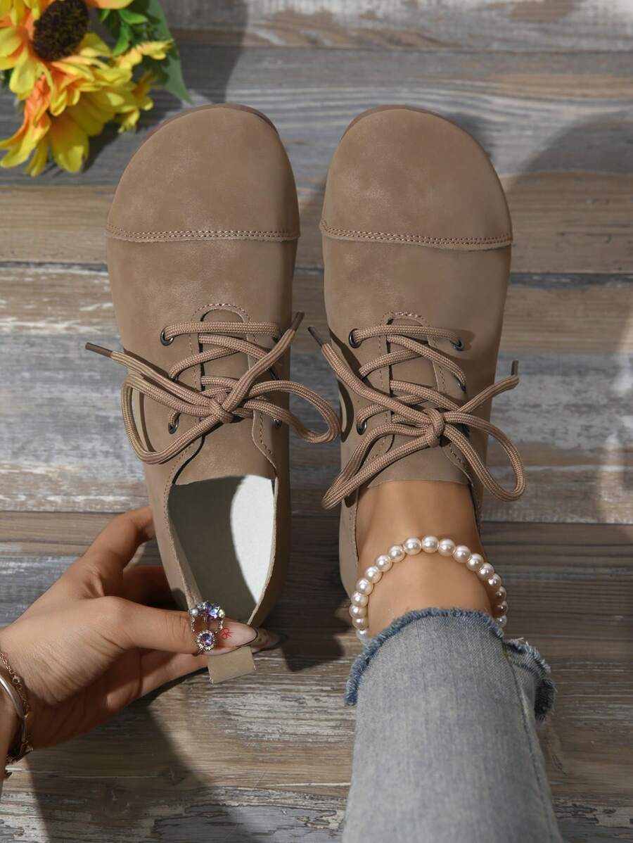 1 par de zapatos deportivos casuales de mujer, de suela ligera y suave con cordones, moda, nuevo material delgado y ligero resistente a la abrasión, unicolor, puntera plana y redonda, diseño de cordón deslizante, zapatos planos deportivos cómodos