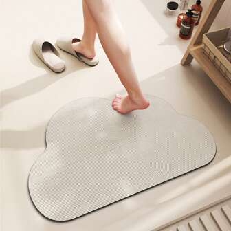 1 片印花不规则形状地垫，适用于卫生间入口、洗手池地面、厨房、阳台、吧台等场所。硅藻土吸水缓冲垫，可水洗（可局部擦拭清洁）。