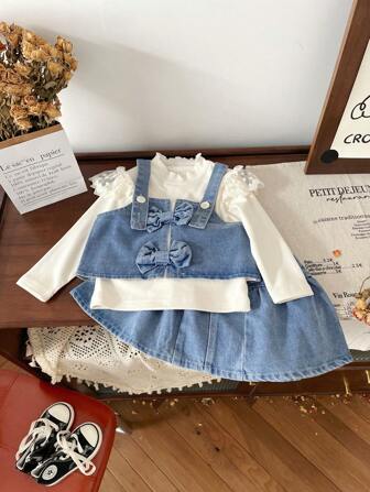 年轻女孩可爱蝴蝶结洗水蓝牛仔背心 + 蕾丝立领长袖打底衫 + 洗水蓝牛仔短裙