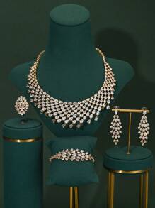 Juego de joyería de 4 piezas con exagerado y espectacular broche de gota de agua con borlas - collar, aretes, anillo, brazalete, chapado en cobre dorado con piedras de circonia, adecuado para bodas de mujeres, eventos formales