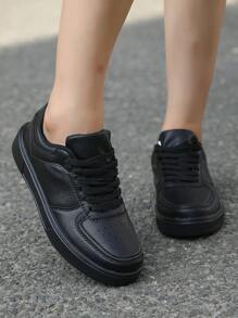 Zapatillas negras sencillas y de moda para mujer, calzado deportivo de suela suave y cómodo, de unicolor, con cordones, de silueta baja - Negro - Ver 2