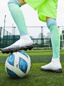 Fußballschuhe mit Stollen für Jungen und Mädchen, professionelle Outdoor-Fußballschuhe mit geometrischem Muster, rutschfest und atmungsaktiv, mit Schnürsenkel für Training und Wettkampf