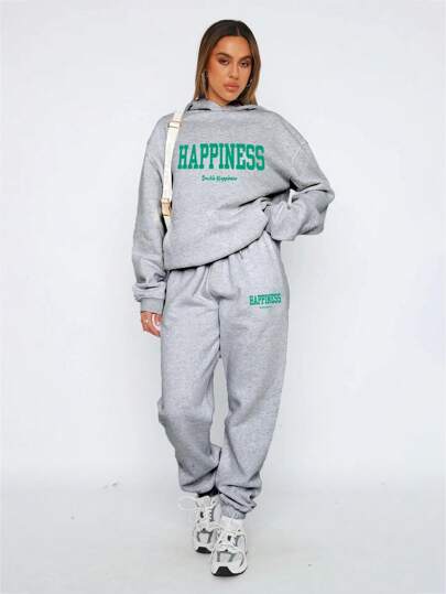 2 piezas Conjunto informal de mujer con top y pantalones, de bolsillo con cordón y estampado de letra con capucha