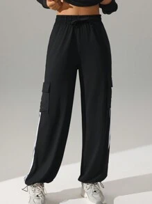 Pantalones deportivos casuales de tiro alto con bolsillos y raya lateral, de corte holgado. Pantalones de yoga con cordón, cintura elástica y puños, apropiados para el uso diario, trotar, hacer ejercicio
