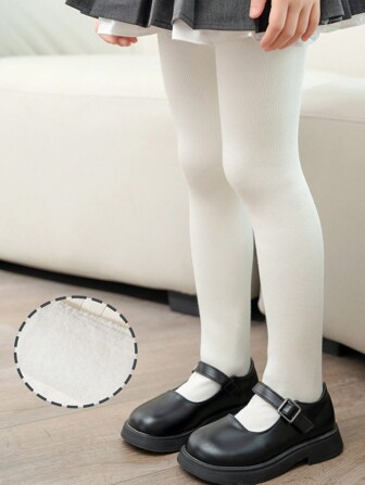 1件儿童纯色加厚保暖连裤袜，适合秋冬季日常穿着