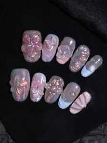 10 uñas postizas ovaladas cortas reutilizables con diseño de flor 3D y patrón de cinta en múltiples colores de caramelo, hechas a mano, con decoraciones de lazos para diseños de arte de uñas para mujeres y niñas en todas las estaciones
