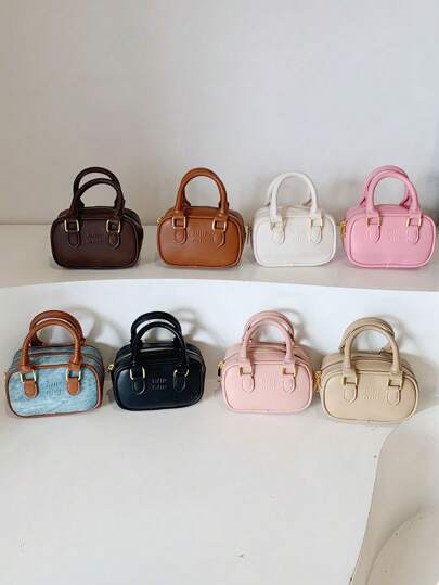 新款迷你保龄球包，复古手提包，简约百搭。主要用于挂装饰物品。容量小，实用性不高。