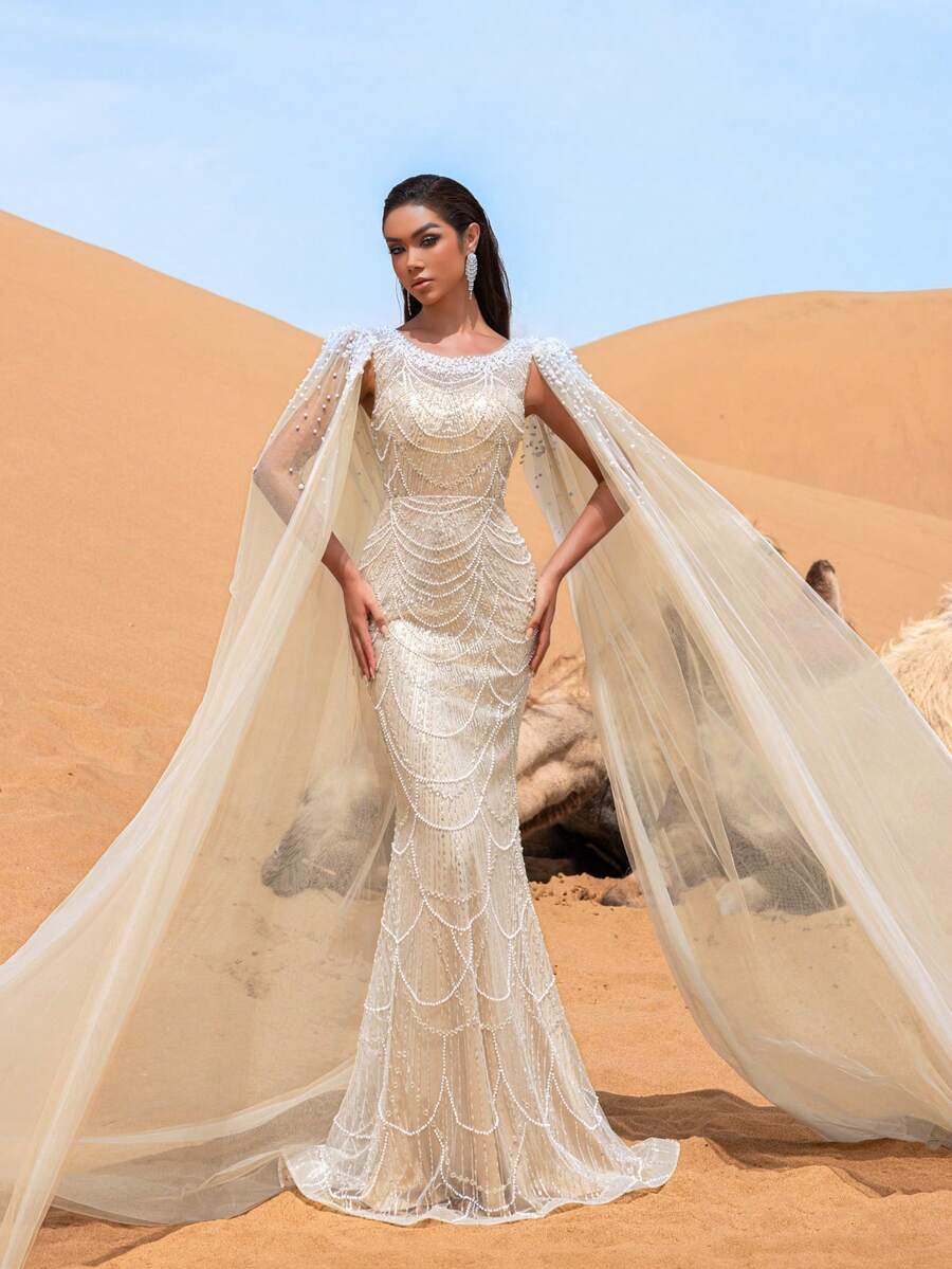 Faeriesty 惊艳的美人鱼晚礼服，饰以精致串珠和亮片点缀——完美适用于正式晚宴、盛大晚会、红毯派对和奢华婚礼等场合，尽显优雅气质。 - 杏色 - 查看 1