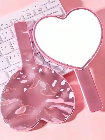 1 pièce Miroir portable en forme de cœur ondulé avec électrodéposition, miroir mignon et compact haute définition pour les filles, le maquillage, peu coûteux, la décoration de la chambre, la coiffeuse, les voyages, la chambre à coucher, les accessoires de maquillage, le miroir, le miroir de coiffeuse, le mini miroir, le miroir compact, le petit miroir, le miroir à main, peu coûteux, les articles pour les bas de Noël, le maquillage, les outils de maquillage, les articles peu coûteux, les cadeaux, les cadeaux pour les femmes, les cadeaux de Noël, les cadeaux, les articles essentiels de voyage