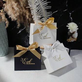 10 stuks Eid Mubarak Mini Geschenkdozen Stijlvolle Zwart-Witte Gunstzakjes Met Elegante Gouden Folie Accenten En Satijnen Linten. Perfect Voor Snoep, Chocolade En Kleine Geschenken. Ideaal Voor Eid Feesten, Bruiloften En Feestelijke Samenkomsten. Chique Verpakking Voor Onvergetelijke Momenten