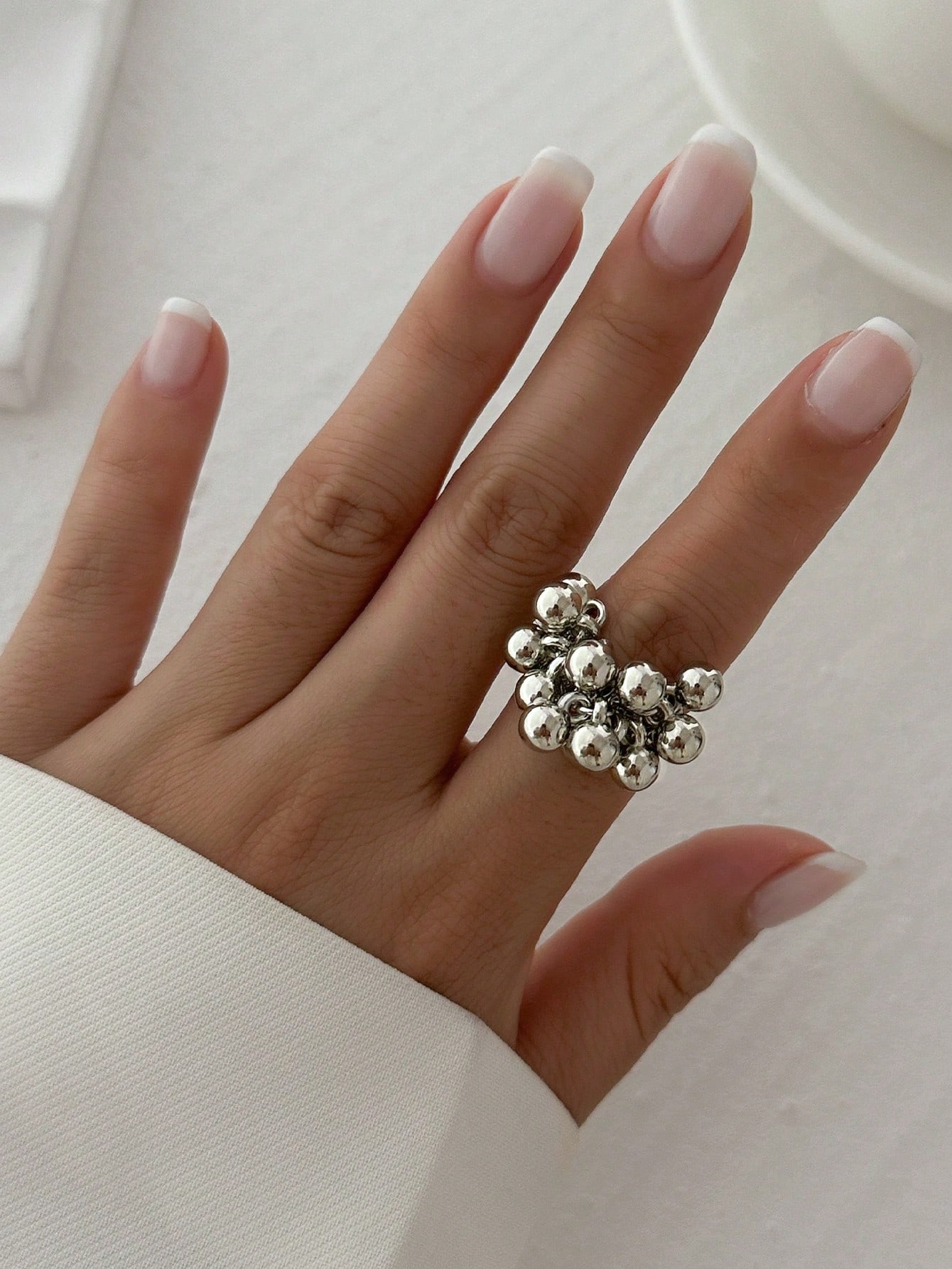 Asymmetrical abstract open ring