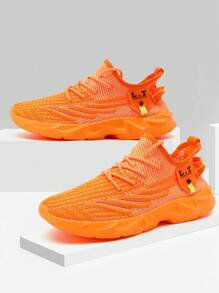 Baskets hommes Chaussures de course sur route à lame antidérapante, maille respirante. Chaussures de sport légères pour la gym, l'entraînement et la marche. mode jeune, style basket street. Couleur orange