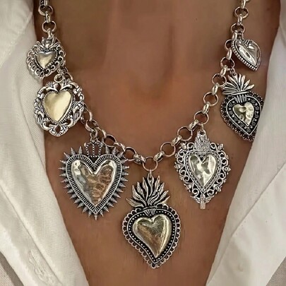 1 pieza Collar con colgante de corazón exagerado vintage, emparejado con varios dijes de corazón sagrado, accesorio elegante y único para atuendos casuales, apropiado para todas las estaciones y uso diario, gran regalo (el pedido del colgante es aleatorio)
