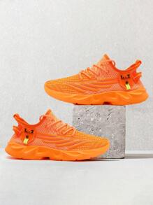 Baskets hommes Chaussures de course sur route à lame antidérapante, maille respirante. Chaussures de sport légères pour la gym, l'entraînement et la marche. mode jeune, style basket street. Couleur orange
