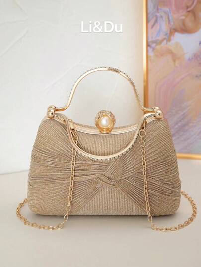 蝴蝶结、优雅、浪漫、水晶装饰手拿包适合晚会和婚礼，可以手提或挎在肩上，与新年服装完美搭配，婚礼必备物品，与毕业礼服、舞会礼服完美搭配