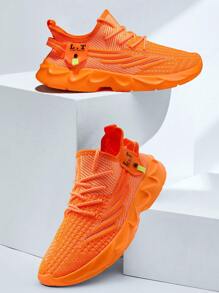Baskets hommes Chaussures de course sur route à lame antidérapante, maille respirante. Chaussures de sport légères pour la gym, l'entraînement et la marche. mode jeune, style basket street. Couleur orange