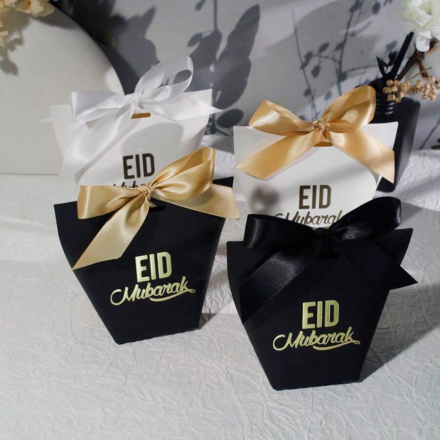 Set de 20 cajas de regalo miniatura elegantes para Eid Mubarak en negro, blanco y dorado con lazos elegantes. Perfectas para dulces, chocolates y regalos pequeños. Ideales para celebraciones de Eid, fiestas y sorpresas. Embalaje elegante para eventos memorables y ocasiones especiales - 6x6x10cm - Ver 1