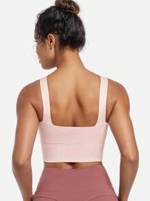 Camiseta de yoga transpirable con sujetador deportivo con función de recogida y a prueba de golpes que le da una hermosa forma a la espalda. Camiseta de entrenamiento para gimnasio.