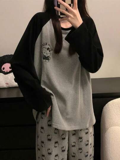 Sanrio 女士可爱卡通图案羊毛保暖 Hello Kitty 睡衣套装，包含长袖圆领上衣和裤子，舒适宽松版型，适合春秋冬秋季服装