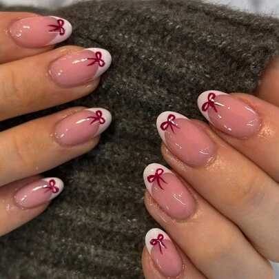 24片极简可爱美甲套装，中号椭圆形假指甲，白色法式尖头，红色蝴蝶结设计，亮面假指甲，适合女性日常佩戴，包含指甲锉和凝胶美甲用品