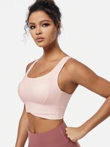 Camiseta de yoga transpirable con sujetador deportivo con función de recogida y a prueba de golpes que le da una hermosa forma a la espalda. Camiseta de entrenamiento para gimnasio.