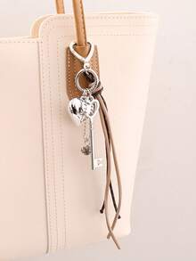 Llavero con colgante de corazón, accesorios para llaves con cordón trenzado de colores múltiples, artículos creativos, colgante de corazón de metal, llavero de equipaje, accesorios para cordones, colgante con borla y hebilla con forma de corazón, colgante para teléfono móvil