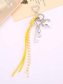 Llavero con colgante de corazón, accesorios para llaves con cordón trenzado de colores múltiples, artículos creativos, colgante de corazón de metal, llavero de equipaje, accesorios para cordones, colgante con borla y hebilla con forma de corazón, colgante para teléfono móvil