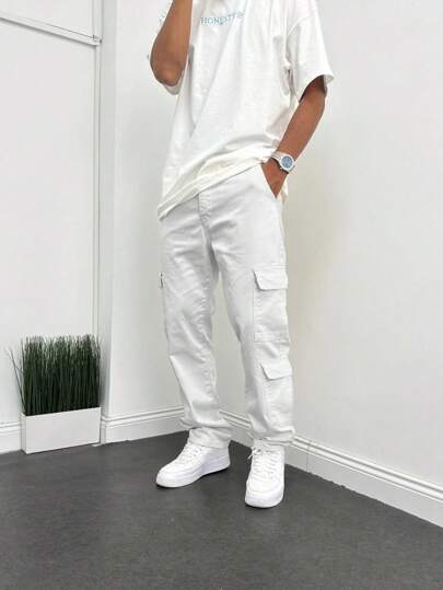 Jeans casuales holgados con múltiples bolsillos para hombre, pantalones cargo rectos de moda para uso callejero