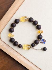 VE 1 Peça Pulseira Premium de Pau-de-águia Natural Prata com Contas de Quartzo Amarelo de Qualidade. A Pulseira de Pau-de-águia é combinada com o Quartzo Amarelo, emitindo uma fragrância elegante. O brilhante Quartzo Amarelo simboliza sabedoria e riqueza. O design exclusivo transmite significados auspiciosos e prósperos, adequado para acessorizar o pulso e exibir o estilo pessoal. A cor natural da pedra preciosa é aleatória.
