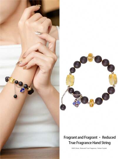  1pc Premium Silver Natural Aloeswood Bracelet With Quality Yellow Quartz Beads. The Aloeswood Bracelet Is Combined With The Yellow Quartz, Emitting A Graceful Fragrance. The Radiant Yellow Quartz Symbolizes Wisdom And Wealth. The Unique Design Conveys Auspicious And Prosperous Meanings, Suitable For Accessorizing The Wrist And Showcasing Personal Style. The Natural Gemstone Color Is Random.