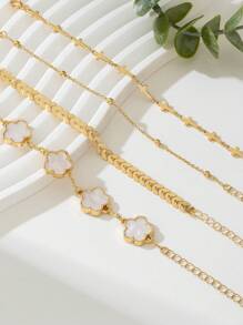 4 件套女士金手链，带幸运四叶草、飞机、珠子和吊饰