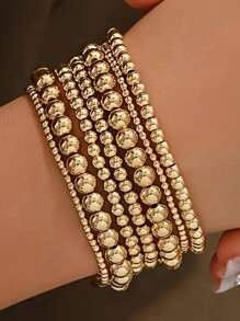 Set de 7 pulseras elásticas con cuentas de estilo de moda, hechas a mano con cuentas metálicas para mujeres