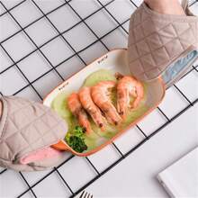 2 pièces de dessous de plat en silicone résistant à la chaleur avec housse en tissu - polyvalent pour supports de casserole, dessous de plat pour micro-ondes/four, support de poignée de poêle, tapis de plan de travail de cuisine