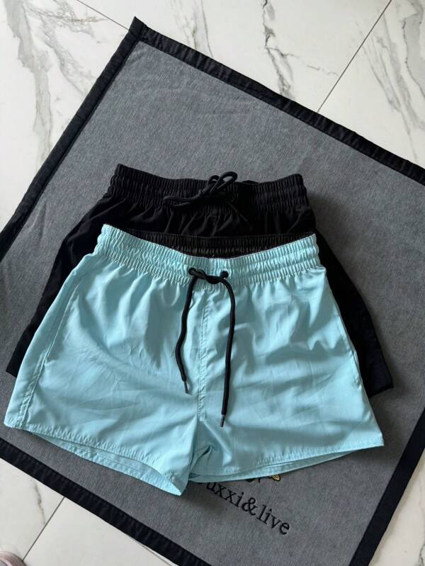Kit com 2 Shorts Feminino Tactel Neon , ideal para todas as ocasiões, Praia, Academia, Corrida, Casual. Com Símbolo Bordado na Perna, 2 Bolsos  Possui Elástico na Cintura e Cordão para Ajuste, podendo ser usado para fora ou para dentro do short.