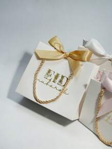 5pcs Elegant Eid Mubarak Mini Gift Bags Chic Paper Gift Bags With Beautiful Bow Ribbons And Stylish Gold Foil Print. Perfect For Storing Candies, Chocolates, And Small Gifts. Ideal For Eid Celebrations, Special Occasions, And Thoughtful Surprises. Luxurious Packaging For Memorable Moments - 14X6X12cm - View 2