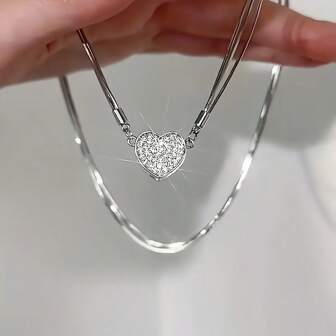 1 pieza Elegante collar colgante magnético con forma de corazón, cadena de acero inoxidable, adecuado como regalo de Navidad y para combinar con atuendo festivo