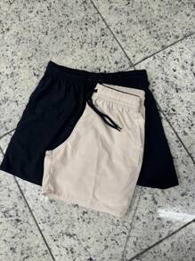 Kit With 2 Tactel Neon Shorts, Ideal For All Occasions, Beach, Gym, Running, Casual. With Embroidered Symbol On The Leg, 2 Pockets It Has Elastic At The Waist And Drawstring For Adjustment, And Can Be Worn Outside Or Inside The Shorts. - Beige - View 2