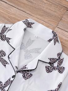 Conjunto de pijama de 2 piezas para mujer, con camisa de manga corta con botones de solapa y pantalones cortos holgados con elástico, informal para exterior y para el hogar, adecuado para todas las estaciones