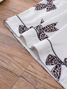 Conjunto de pijama de 2 piezas para mujer, con camisa de manga corta con botones de solapa y pantalones cortos holgados con elástico, informal para exterior y para el hogar, adecuado para todas las estaciones