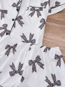 Conjunto de pijama de 2 piezas para mujer, con camisa de manga corta con botones de solapa y pantalones cortos holgados con elástico, informal para exterior y para el hogar, adecuado para todas las estaciones