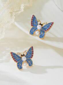 1 par de elegantes pendientes con forma de mariposa azul decorados con perlas, accesorios delicados y románticos adecuados para citas, regalo para novia o amigas