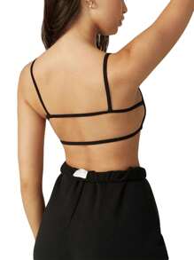 Camiseta sin mangas sexy sin espalda para correr, fitness y yoga, estilo 2021. Camisetas sin mangas con aberturas, top corto deportivo y ropa urbana para mujer. - Negro - Ver 4