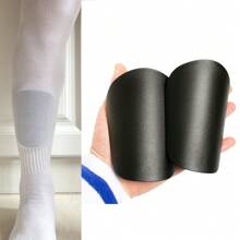 1 paio di parastinchi neri mini per calcio, imbottiture per protezione gambe per il calcio