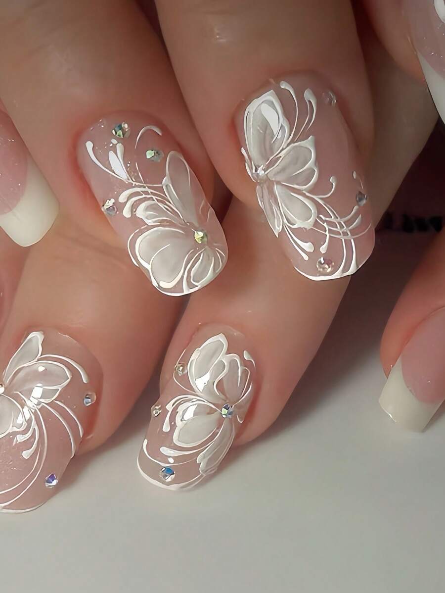 Actualiza tu look instantáneamente con el juego de 24 piezas de uñas postizas cuadradas medianas en un estilo francés blanco sencillo y elegante. Incluye pegatinas adhesivas y una lima mini. Envío aleatorio.