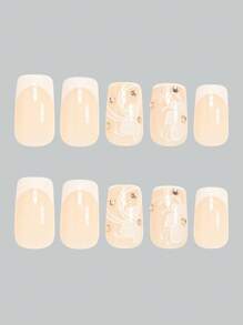 Actualiza tu look instantáneamente con el juego de 24 piezas de uñas postizas cuadradas medianas en un estilo francés blanco sencillo y elegante. Incluye pegatinas adhesivas y una lima mini. Envío aleatorio.