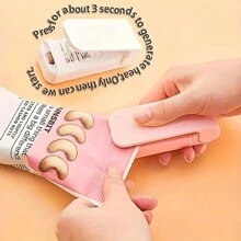 1 件迷你便携式热封机，手持式塑料袋封口机，家用食品封口机，零食和礼品包装工具，适用于糖果、巧克力、饼干等。（颜色随机）