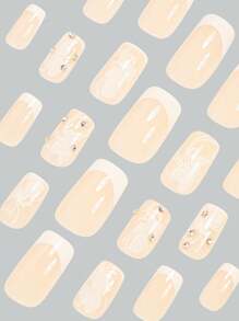 Actualiza tu look instantáneamente con el juego de 24 piezas de uñas postizas cuadradas medianas en un estilo francés blanco sencillo y elegante. Incluye pegatinas adhesivas y una lima mini. Envío aleatorio.