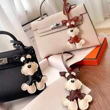 1 pieza Llavero con forma de perro Schnauzer de estilo de moda de PU, llavero de animal bonito, adecuado para bolsos, lindo accesorio colgante para bolso, novedoso llavero de mujer para llaves y billeteras, accesorio de coche, colgante para mochila escolar con diseño animal