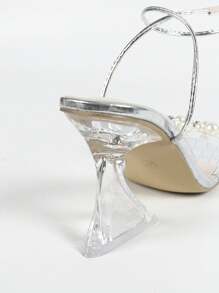 Sandalias de mujer nuevas de metal plateado, con estampado de piel de cocodrilo, moda lujosa y sexy, de estilo minimalista y elegante, con tiras transparentes, perlas y tacón de cristal de tacón alto