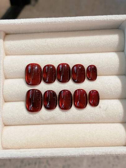 10个手工制作的可穿戴指甲贴，酒红色椭圆形水晶短款即时佩戴按压式指甲贴，含2个果冻胶和1个指甲锉。适合女性派对、舞会、休闲装，可重复使用美甲用品